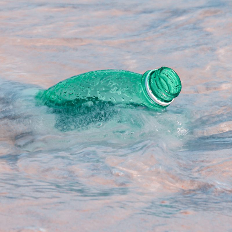 water bottle floating in ocean plastic water bottle floating in ocean