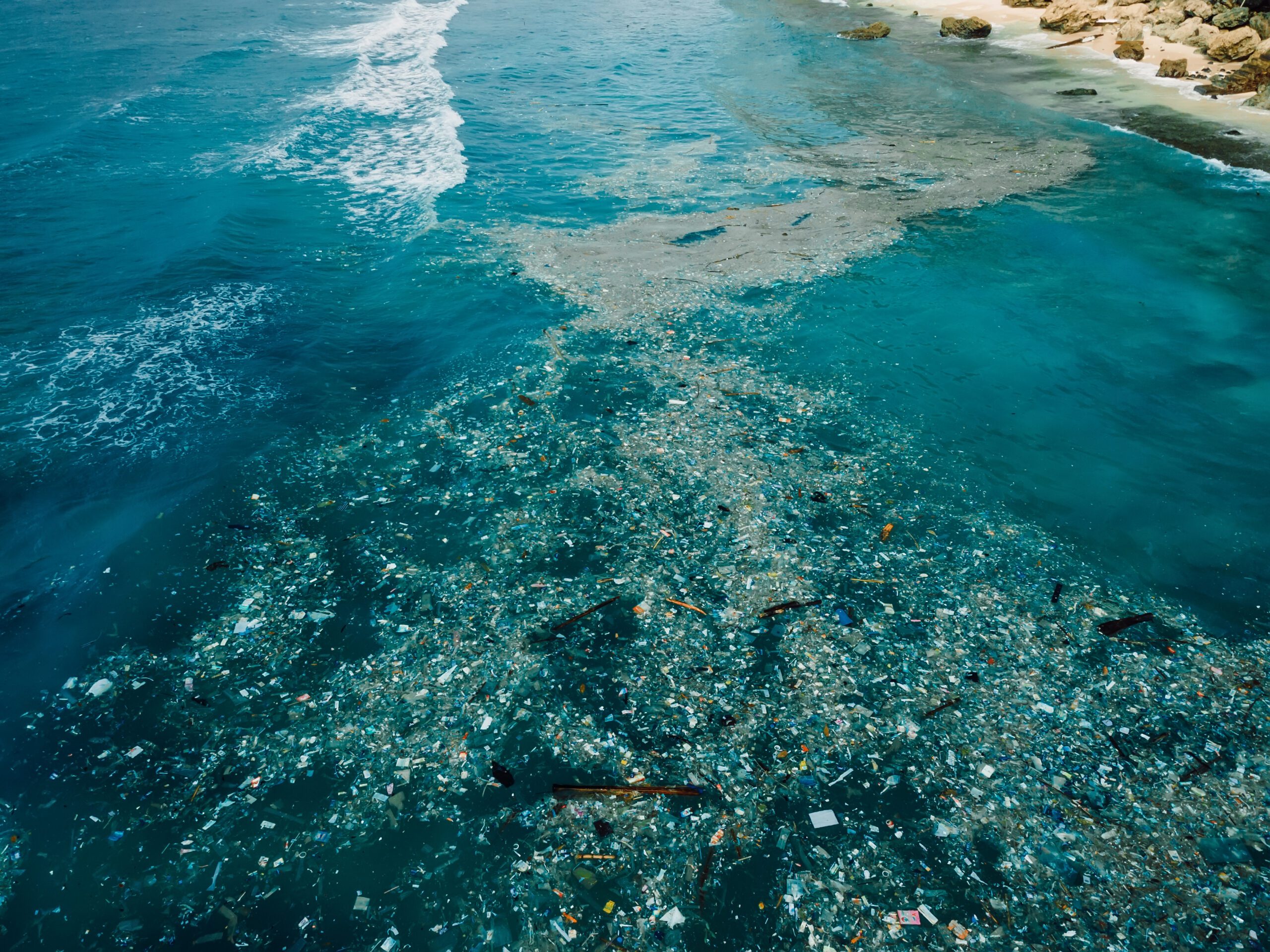 Indian ocean and plastic trash pollution, aerial view. Pollution by toxic rubbish aerial view of plastic pollution in the ocean