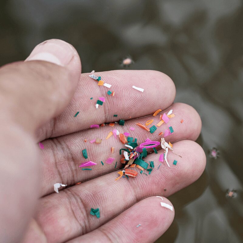 close-up-shot-of-microplastics-placed-on-a-person close-up shot of microplastics in hand